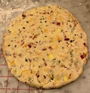 Bacon Cheddar Chive Scones dough being shaped